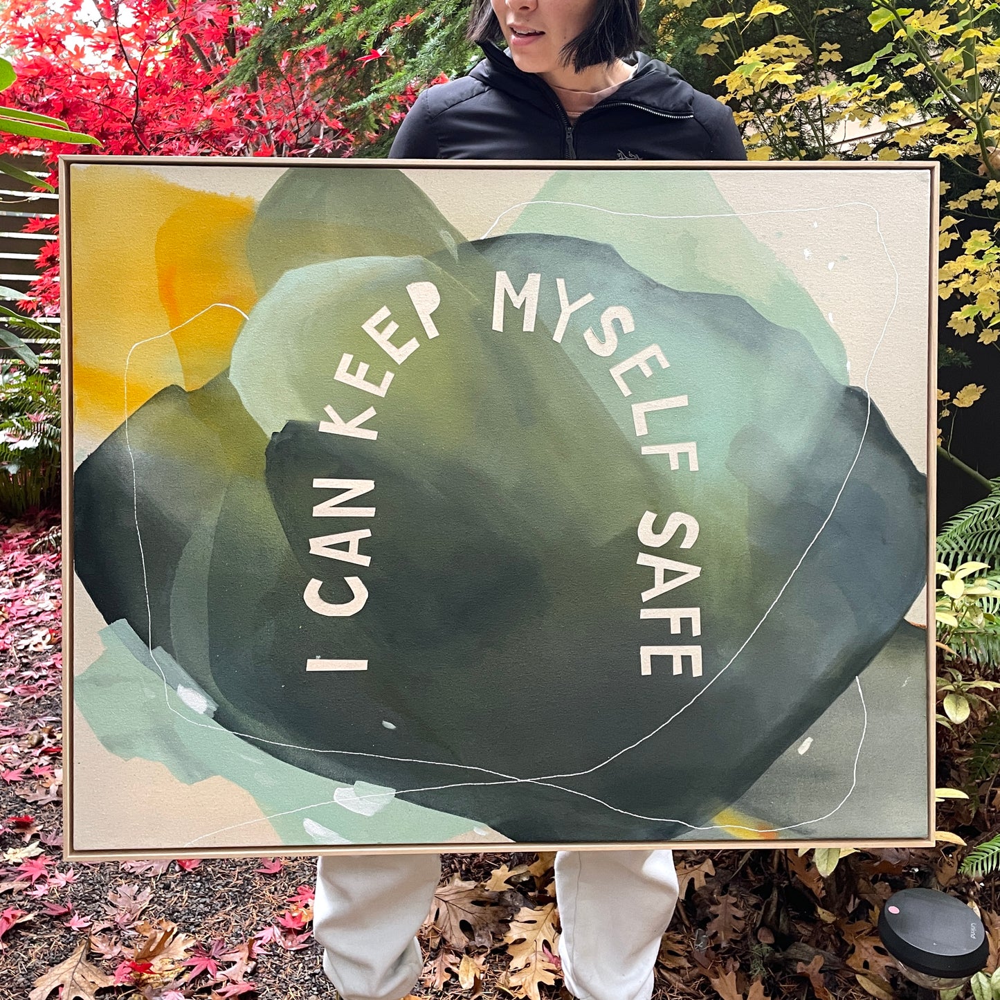 person holding original painting I CAN KEEP MYSELF SAFE by britchida