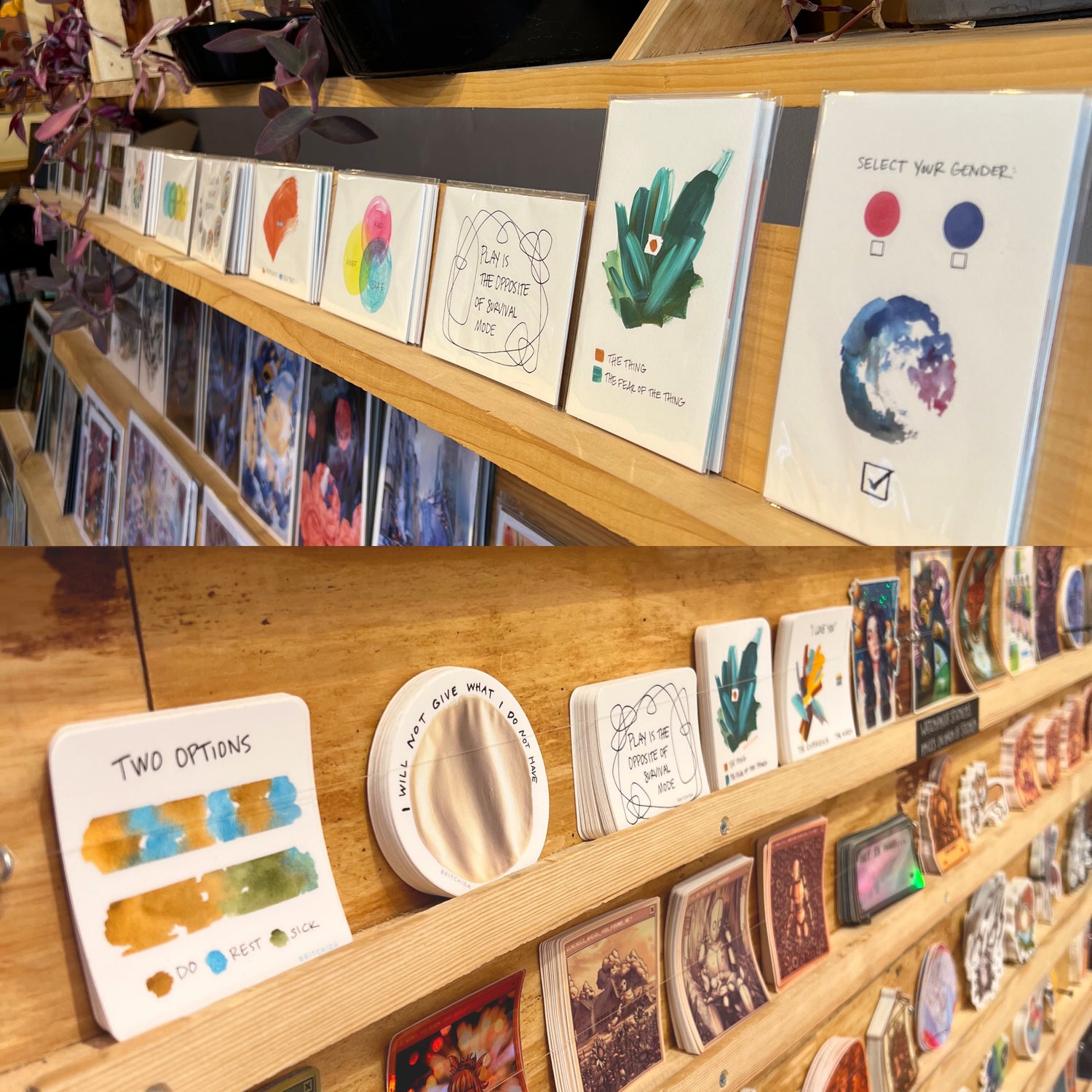 wooden display shelves of abstract prints and stickers by britchida lined up alongside other stickers and prints from other artists