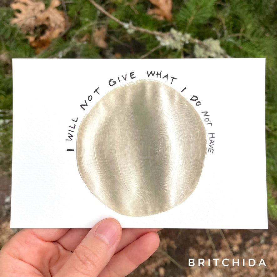a solid beige circle with the words “I will not give what I do not have” written around its border.