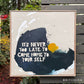 Framed original abstract painting on canvas by artist britchida with blue, yellow, and white colors. There is text n relief of the blue paint that reads, "It's never too late to come home to yourself."