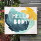 framed original of large abstract painting with navy, light teal, and yellow shapes on a white background. the center block text in white reads "HELLO BODY"