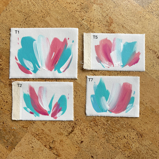 four abstract pride flag painting with various shapes of blue, white, and pink colors