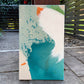 original abstract painting by britchida with teal, orange, green, and white shapes on canvas