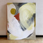 original abstract painting by britchida with yellow, gray, orange, and white shapes on canvas