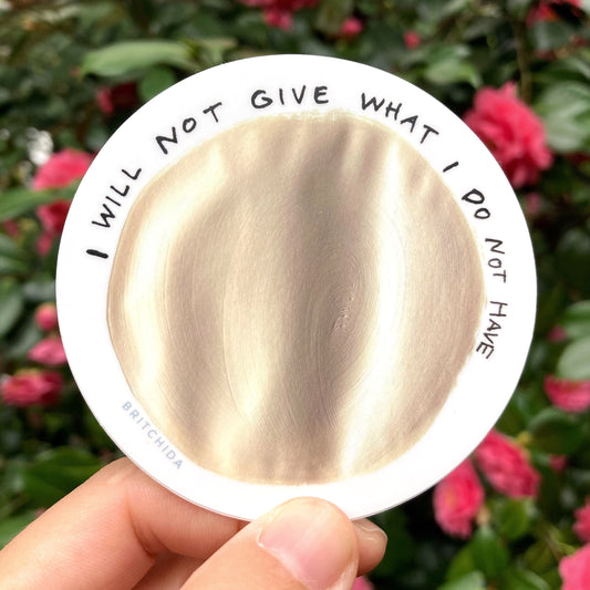 sticker of Give print with a large gold circle that appears like it is on wavy paper. Above reads the text "I will not give what I do not have"