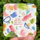 3" sticker of Impending Joy print with various shapes of pink, blue, green, and orange in the background with the text "all the good stuff that hasn't happened yet"