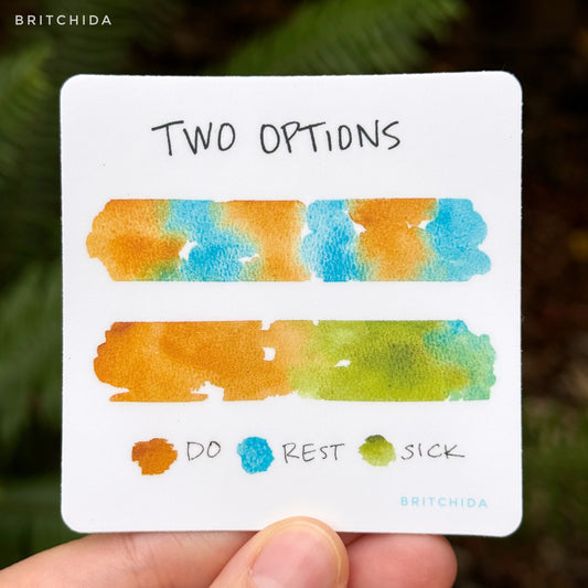 sticker of Two Options print with 2 watercolor lines. The top line alternates between orange and blue. The bottom is orange and bleeds into green with a slight tinge of blue at the right side. The orange is labeled "do"; the blue is labeled "rest". And the green is labeled "sick". At the top are the words "two options"