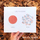The print is titled “Life philosophy.” It has a sold red dot labeled “then” and a loose collection of red and blue swatches labeled: now.