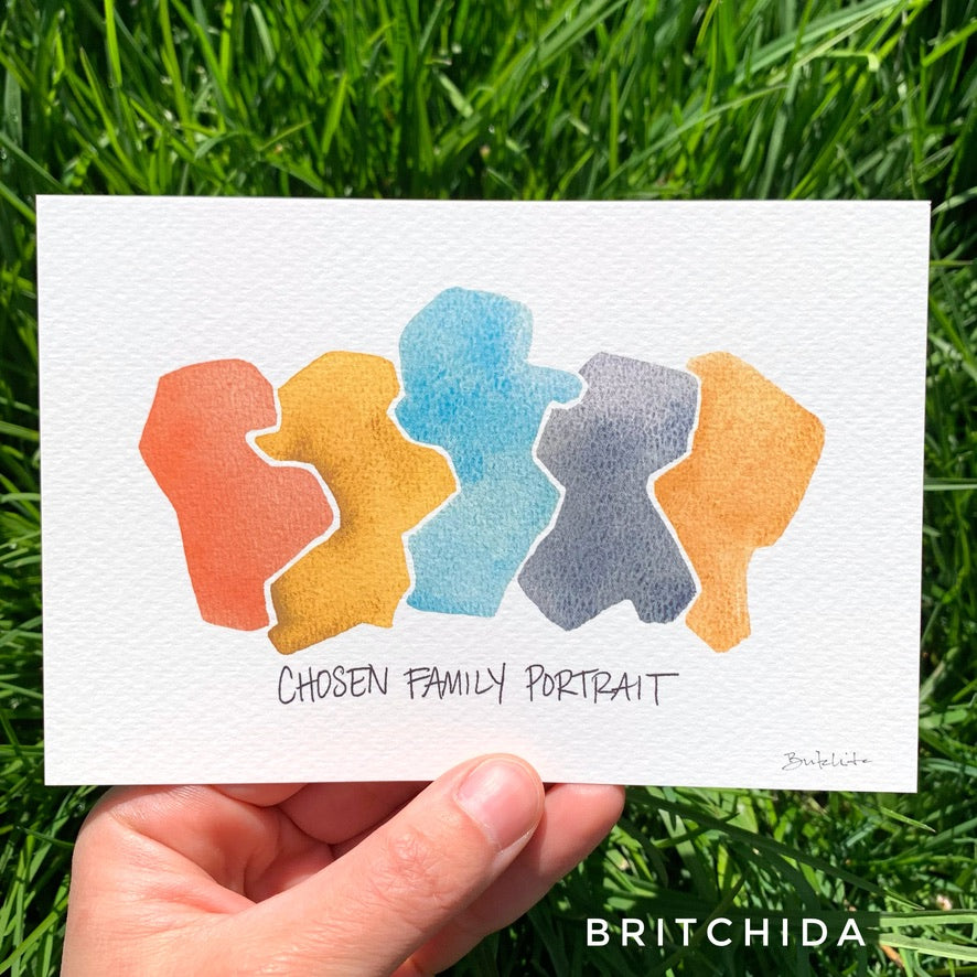 4 inch by 6 inch art print held in hand against a green grass background. The print has five abstract shapes in a slight arc that fit together perfectly, in an earthy and muted rainbow. Titled: Chosen Family Portrait.